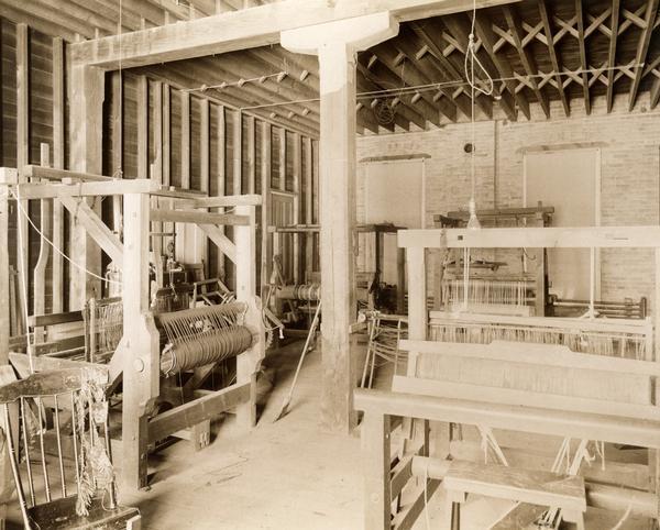 Several looms in the instructional weaving facility at the State School for the Blind.