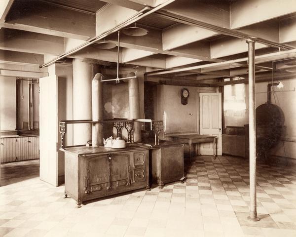 Laundry room at the State Public School, with large range equipment featured.
