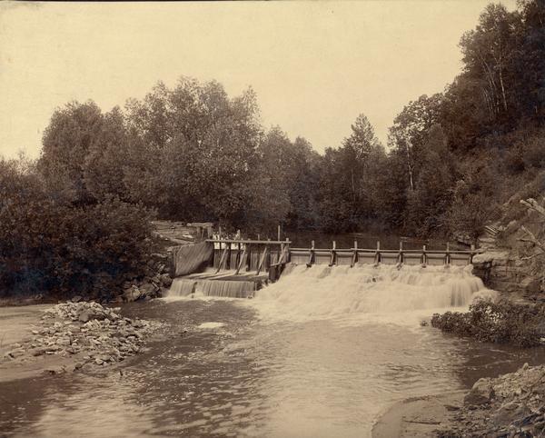 Dam in Buffalo County, Wisconsin. Note on back of print: "Possibly the mill dam at Waumandeee, Wisconsin flour mill."