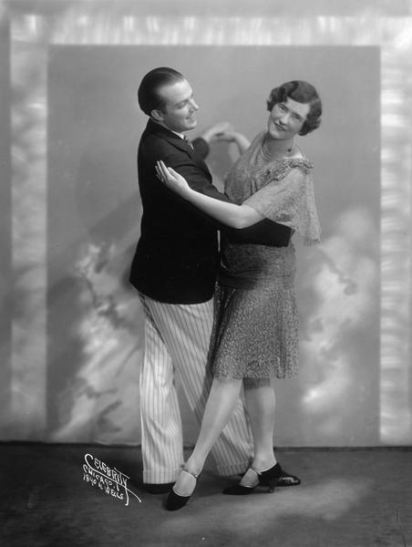 Leo Kehl, head of the Kehl School of Dance, dances a slow foxtrot known as the "Flicker" with his partner, Lucille Stoddart.