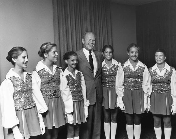 Students at the Kehl School of Dance pose with President Gerald R. Ford. From left to right: Linda Mohs, Polly Mohs, Shannon Gallagher, Ford, Mary Jo Mackesey, Nicki Mohs, Julie Barsness.