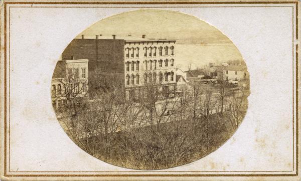 First block of West Main Street. A portion of South Hamilton Street is at the right of the image. The original railroad causeway is at the upper right.