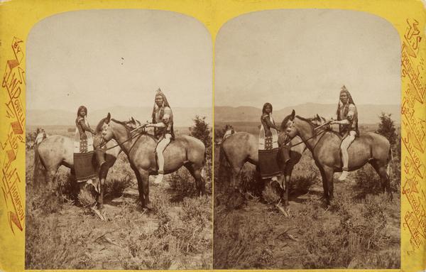 Stereograph of a Native American man and woman, both Ute Indians, on horseback.