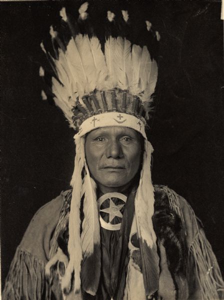 Studio portrait of Ponca man, Wa-non'-she-zhin-ga or Little Soldier. Part of Siouan (Sioux) and Ponka Tribes.