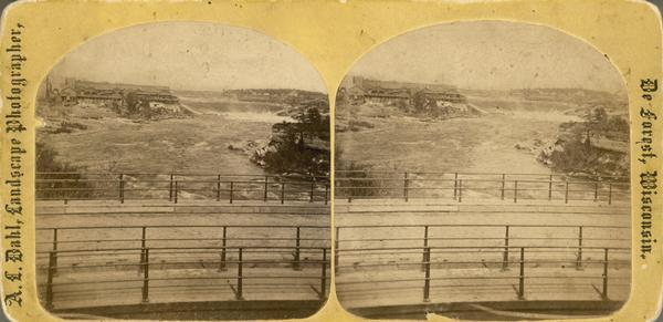 "St. Anthony Falls" photographed during the "Norwegian Lutheran Synod held at Minneapolis, Minn., 1875," as listed in Dahl's 1877 "Catalogue of Stereoscopic Views."