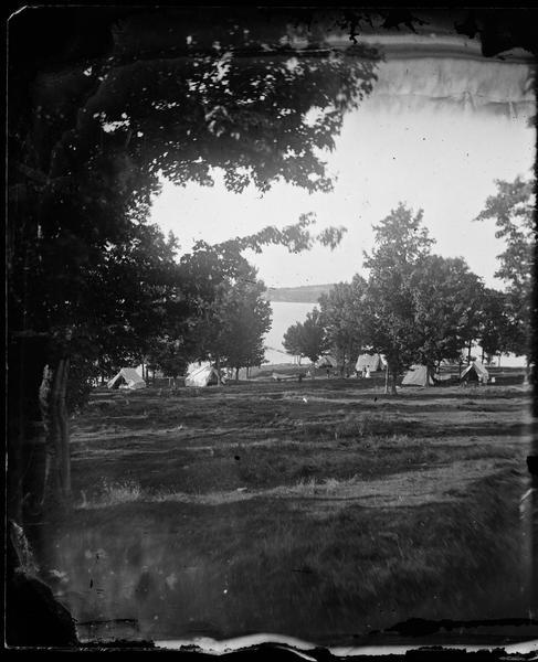 View of campers and tents at McBride's Point at Maple Bluff on Lake Mendota near Madison.