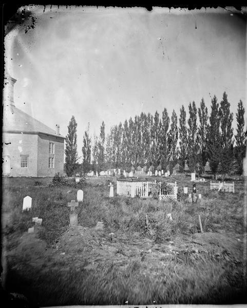 West Koshkonong Lutheran Church, an octagonal stone church built in 1852 and cemetery.  The headstone of Cecilia Martins Datter is legible.  Further references: see Koshkonong Centennial, 1844-1944, p. 18; also Minde fra Jubelferterne paa Koshkonong (Decorah, Iowa, 1894), p. 13.