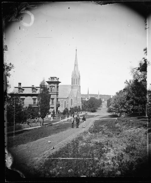 Five churches, including the First Norwegian Lutheran Church, in the foreground, part of a set of stereographs entitled "The Synod at Decorah, 1876" from Dahl's 1877 "Catalog of Stereoscopic Views."