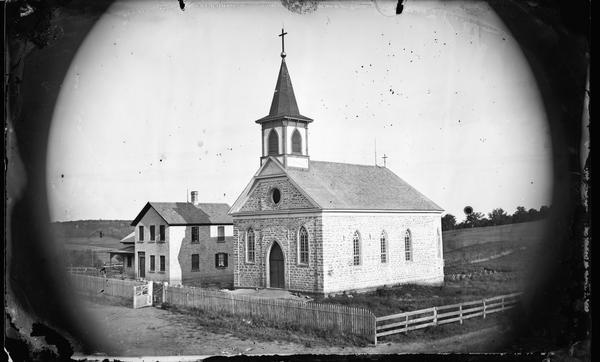 View of St. Peter's Catholic Church, built 1861 and adjacent priest's house.