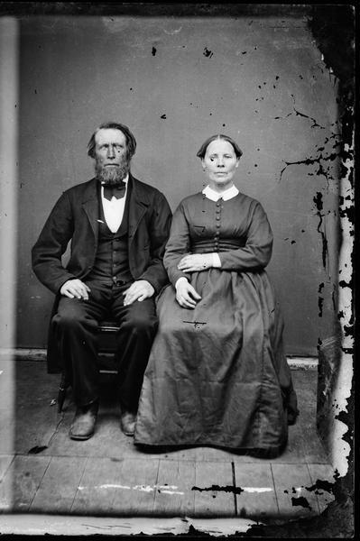 Studio portrait of husband and wife.