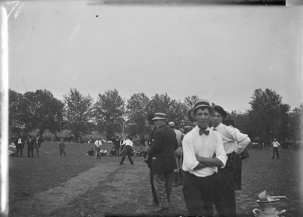 Men on field playing baseball.