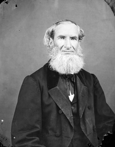 Portrait of an older man with beard.