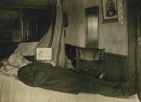 Nils L. Dahl, lying on funeral table.