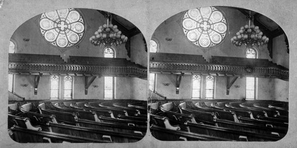 Interior view of the Congregational Church on West Washington Avenue with a good view of the stained glass rose window, from the series "The Beauties of Madison and Surroundings."