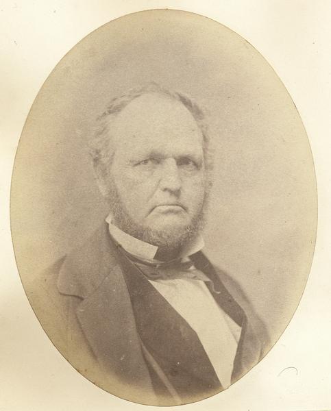 Quarter-length oval portrait of Byron Kilbourn.