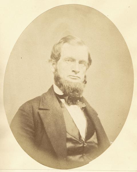 Quarter-length oval portrait of Satterlee Clark. He was born in Washington, D.C., came to Wisconsin in April of 1829, and resided in Green Lake. In 1830, he was appointed by President Andrew Jackson as a trader and relocated to Fort Winnebago, now known as Portage. In March of 1859 he resettled in Horicon. He served in the state Senate from 1862 to 1872, and in the state Assembly in 1873.