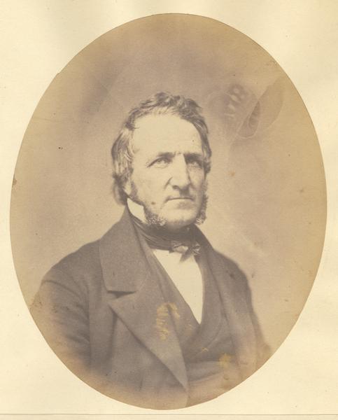 Quarter-length oval portrait of J.P. Dickson. He was born in Danville, Caledonia county, Vermont. Dickson emigrated to Wisconsin on June 20th, 1836, and resided in Janesville. He was present and assisted in raising the first cabin in Janesville. Dickson served as a Janesville alderman to the third ward prior to or during 1866.