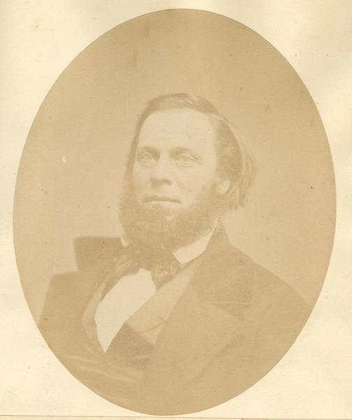 Quarter-length oval portrait of Henry M. Barnes.  He was born in Bedford, New Hampshire, in 1818, and came to Wisconsin Territory in 1834.