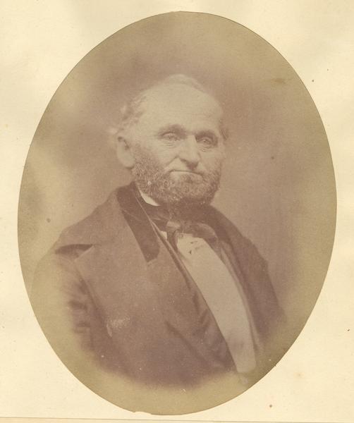 Quarter-length oval portrait of Noah Phelps.  He was born in Lewis County, New York, on May 21, 1808.  Phelps came to Wisconsin on May 1, 1833, and resided in Monroe Township.