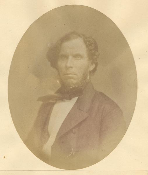 Quarter-length oval portrait of Neely Gray.  He was born in Brook County, Virginia, on February 25, 1810, and came to Wisconsin on April 4, 1835.