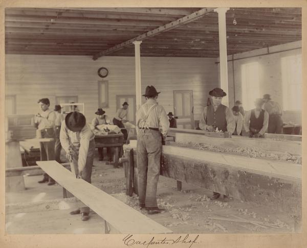 Students working in a carpenter shop at the Indian Industrial School.