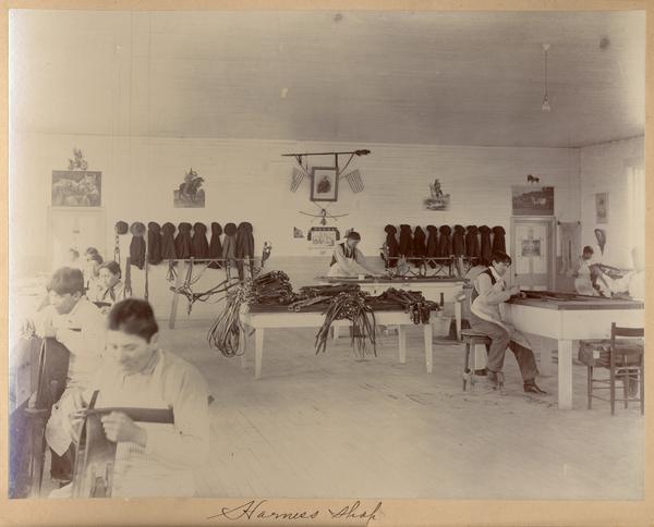 Students working in a harness shop at the Indian Industrial School.