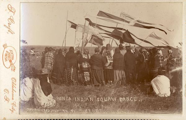 Titled "A Ponca Indian Squaw dance".  The participants hold up flags.