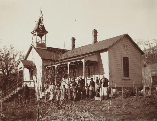 Students and teachers in front of La Jolla day school at Mission Agency, California.