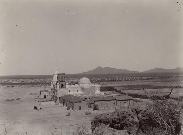 A view of the San Xavier Del Bac Mission and surrounding landscape, near Tucson.