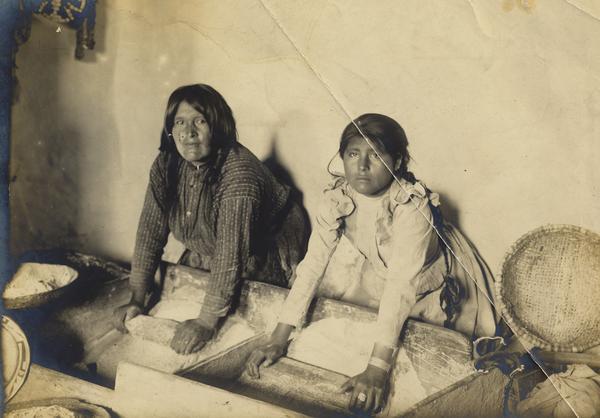Hopi women cooking.