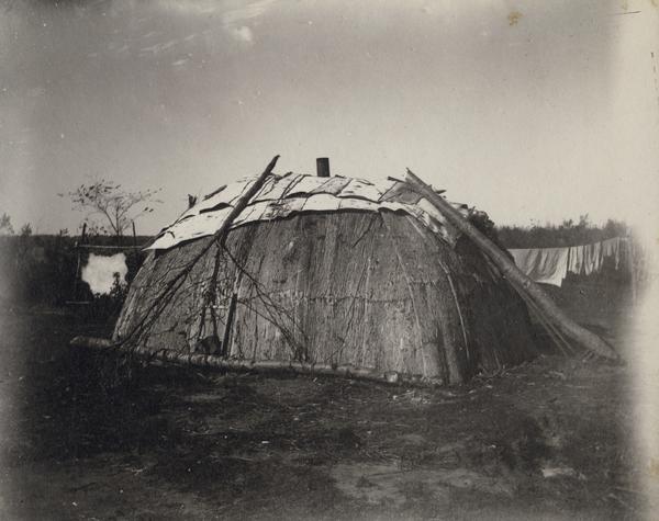 An Ojibwa bark house.  This image is from a collection of images of the Ojibwa-Pillager Battle at Sugar Point on Bear Lake.