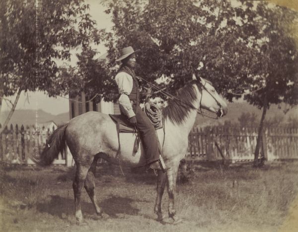 An Indian man on horseback at the Warm Springs Agency in Oregon.
