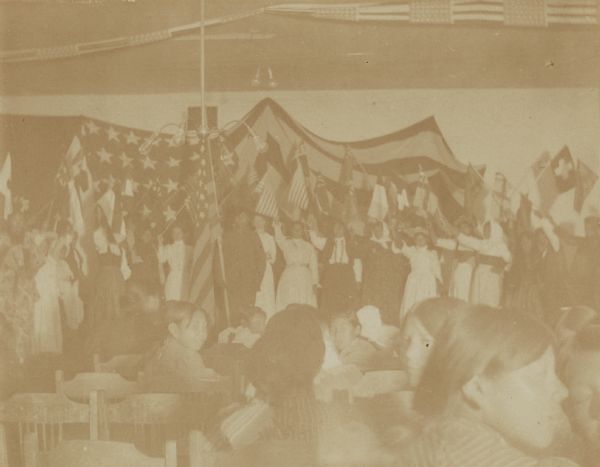 A flashlight of a cantata representing a congress of nations given by the Indian pupils at the Warm Springs Agency in Oregon.