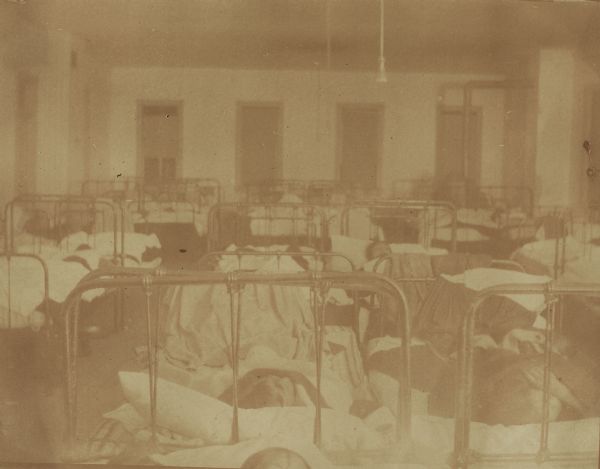 A girl's dormitory or one of the hospital wards during the La Grippe epidemic at the Warm Springs Agency in Oregon.