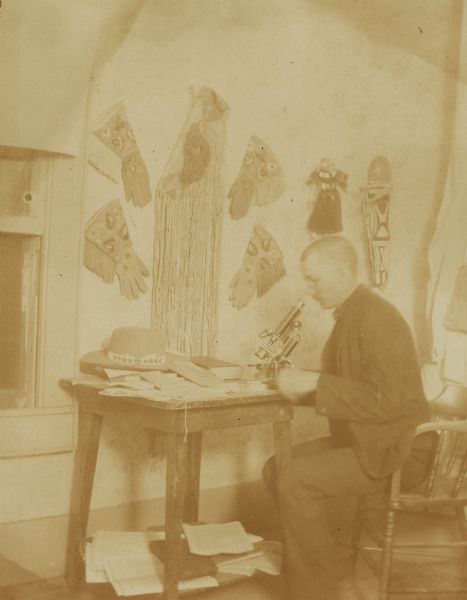 Thomas M. Henderson, M.D., Ph.D., Warm Springs agency physician, in one corner of his studio making some bacteriological investigations.