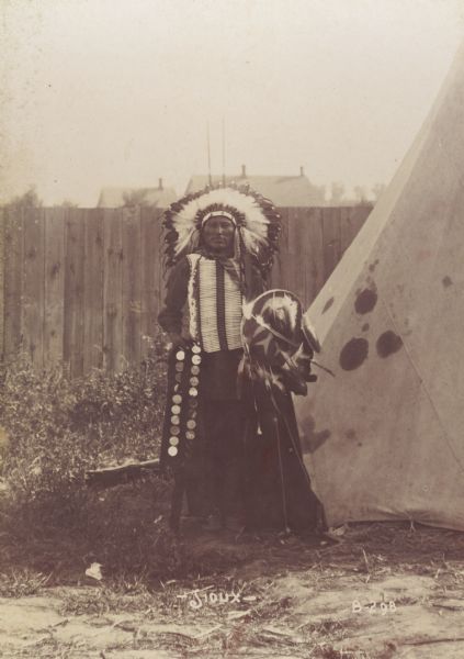 A Sioux man at the Trans-Mississippi Exposition and Indian Congress.