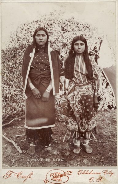 Comanche girls pose for a portrait.