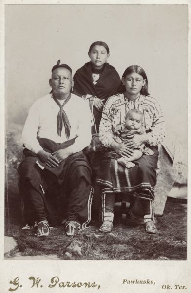 An Osage family gathers for a portrait.