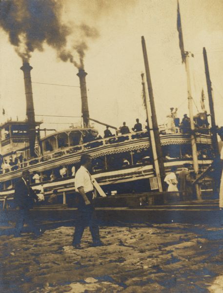 A boat at dock, possibly from a trip taken by William A. Jones and others.