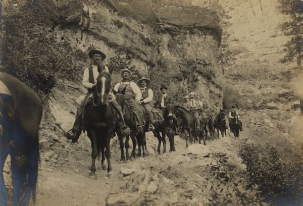 A group of men on horseback, possibly William Arthur Jones and others.