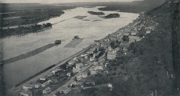 Aerial view of the Mississippi River with log rafts.