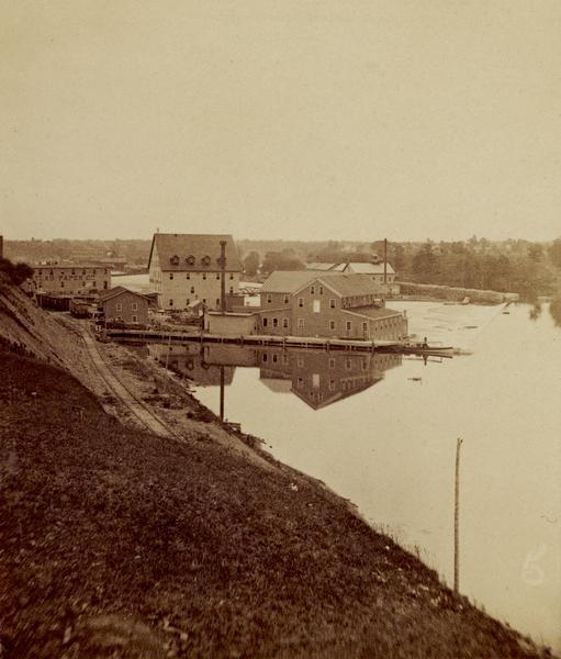 View of paper mill on the river.