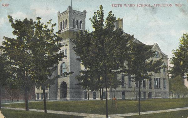 Exterior view  school, partly obscured by trees. Caption reads: "Sixth Ward School, Appleton, Wis."
