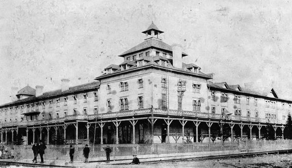 View of the Chequamegon Hotel, built by the Wisconsin Central railroad interests and opened in 1877. It faced the bay and had a long series of steps leading to a boat landing. The hotel was condemned as a fire trap and razed in the 1890's.