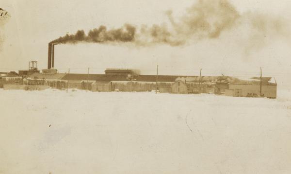 View of the Marathon Paper Mills Company in winter. In 1956, Marathon sold the Ashland plant to the American Can Company, before that, the Menasha Company merged with the Marathon Corporation.