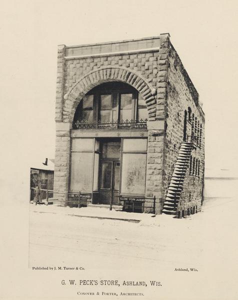 Front view of G.W. Peck's Store. The ground is covered with snow. The signs on the building read "Globe Steam Laundry" and the text below the photograph reads "Conover & Porter, Architects".