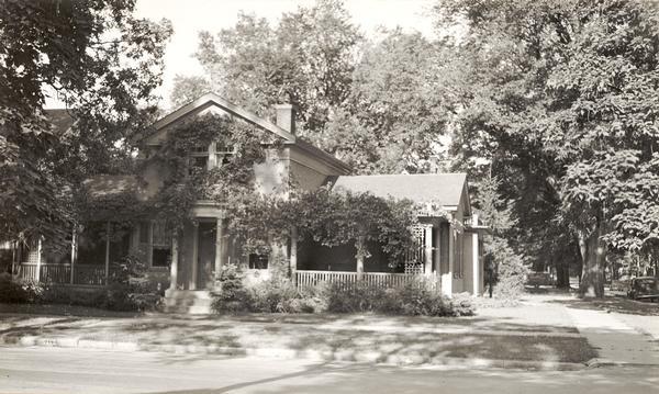 The Trimpey's home, the residence of Edwin B. and Alice Kent Trimpey. View of the front entrance door and front porch facing the street.