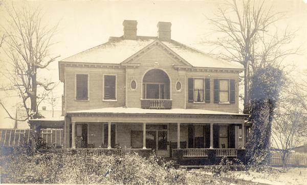 Front view of Trimpey house in winter.