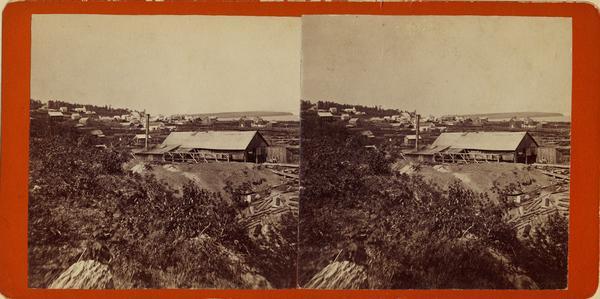 Stereograph image of a sawmill.