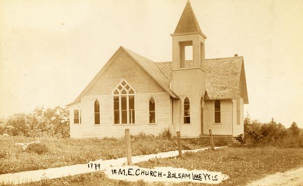 The Methodist Episcopal Church in Balsam Lake. Caption reads: 1ST M. E. Church — Balsam Lake WIS".